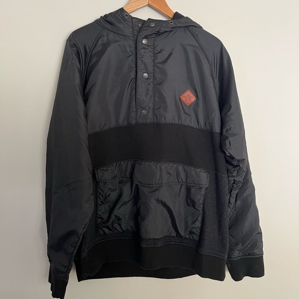 Pullover with front pocket, and hood.